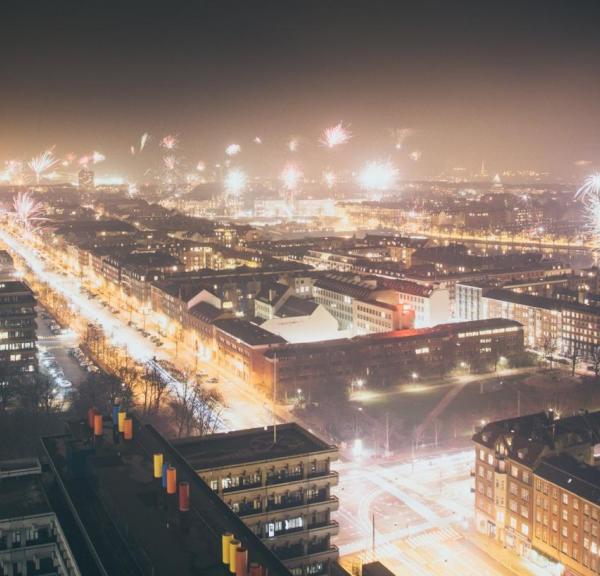 Fireworks going off all over central Copenhagen, Denmark, during New Year’s Eve